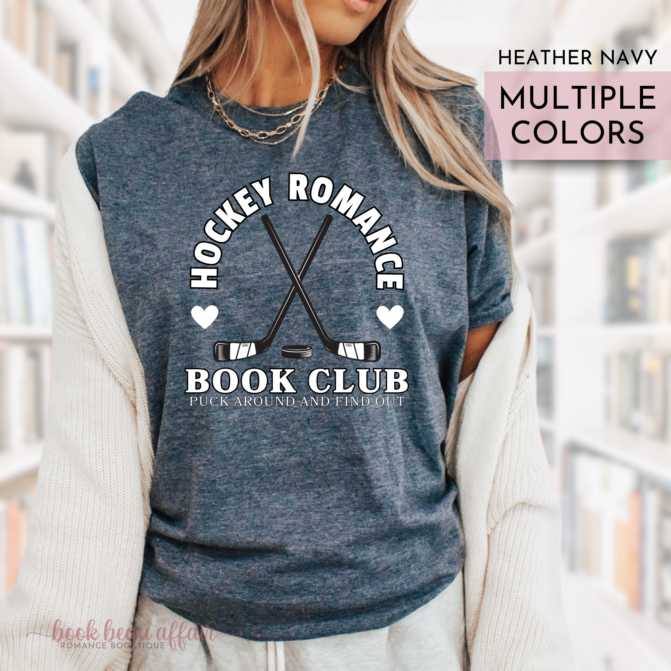 Hockey Romance Book Club graphic tee with 'Puck Around and Find Out' text. funny hockey romance tee for book lovers and sports romance fans. Heather Navy.