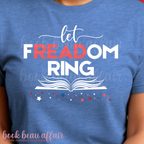 Blue t-shirt with 'let FREADOM RING' text and book graphic on a person wearing it.