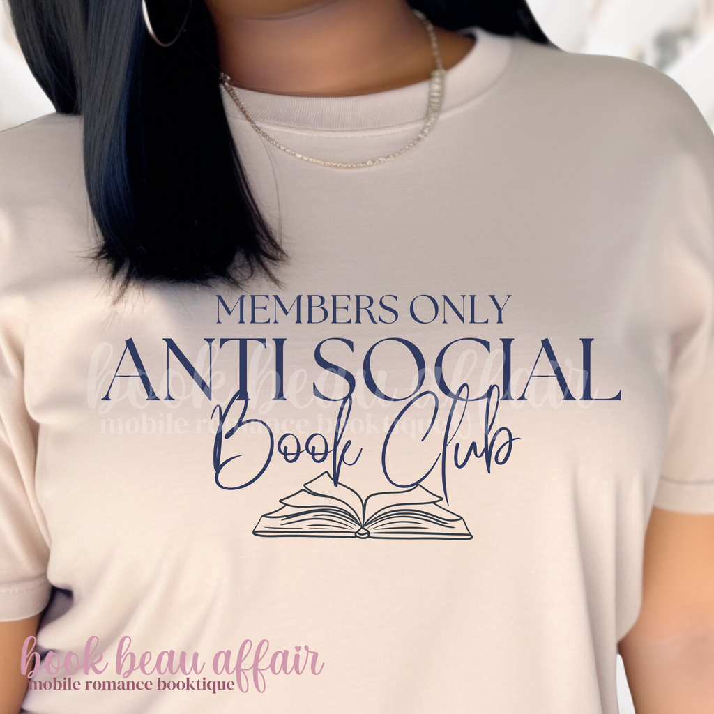 Person wearing a t-shirt with 'Members Only Anti Social Book Club' text and an open book graphic.