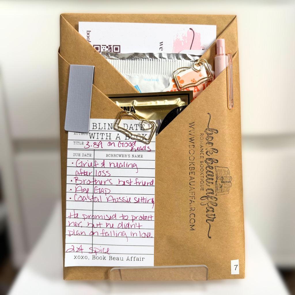 Blind Date with a Book. Mystery Book Wrapped in brown craft paper with a pen, stickers, bookmarks and other goodies
