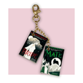 Book-themed keychain with 'Bride' and 'Mate' on a pink background