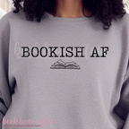 Gray sweatshirt with 'BOOKISH AF' text and book graphic, worn by a person.