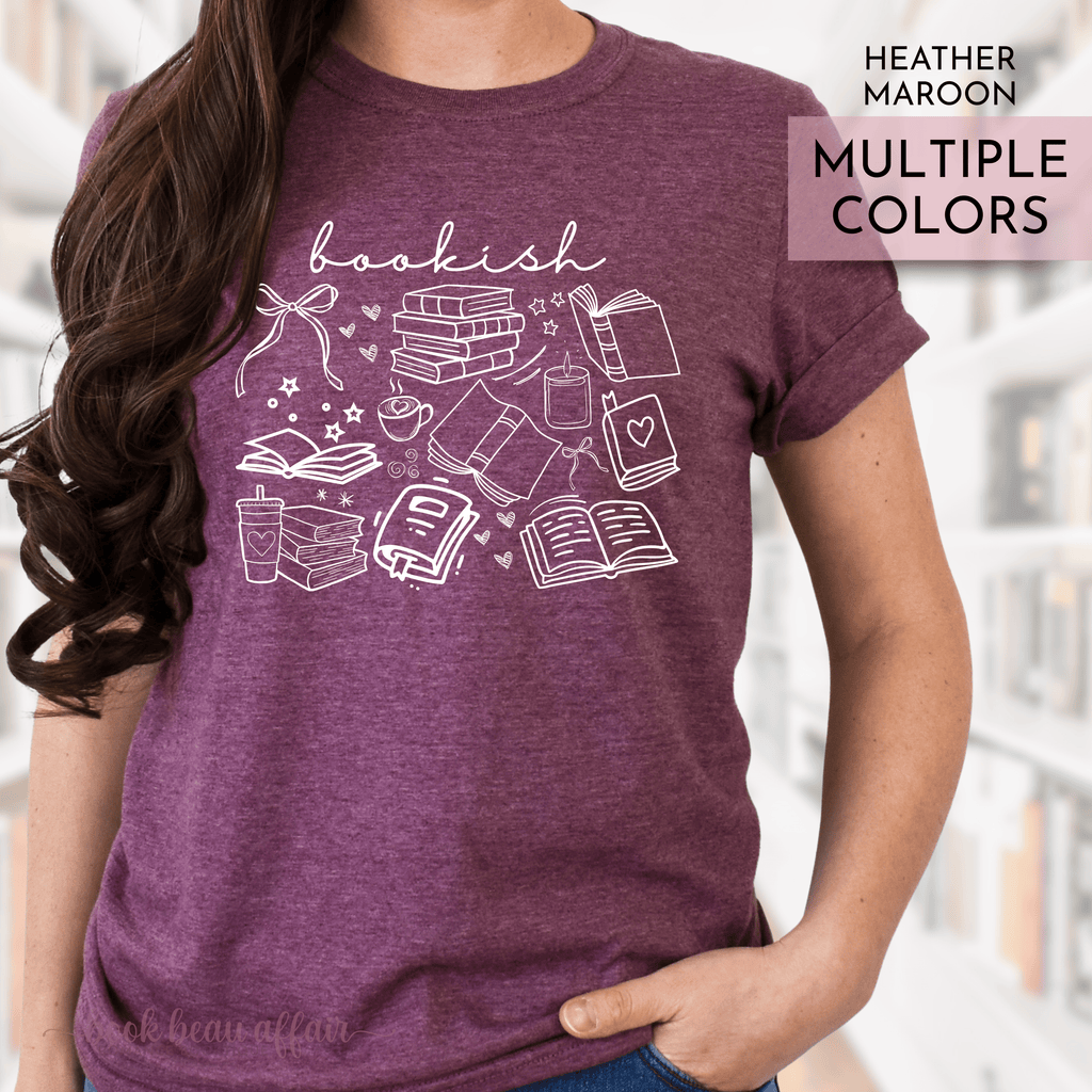 Bookish doodle t-shirt featuring hand-drawn book illustrations and "bookish" text on soft cotton tee. Heather Maroon