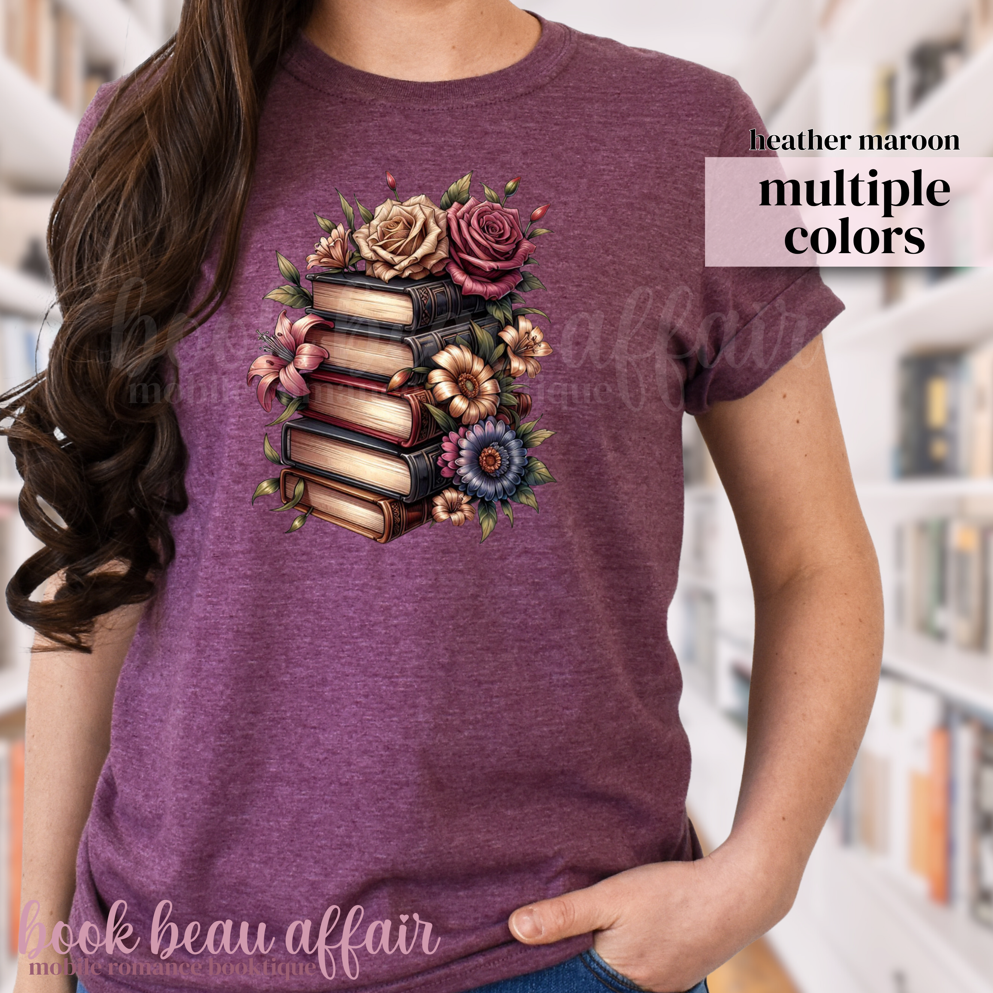 Maroon t-shirt with a design of books and flowers on a person wearing it.