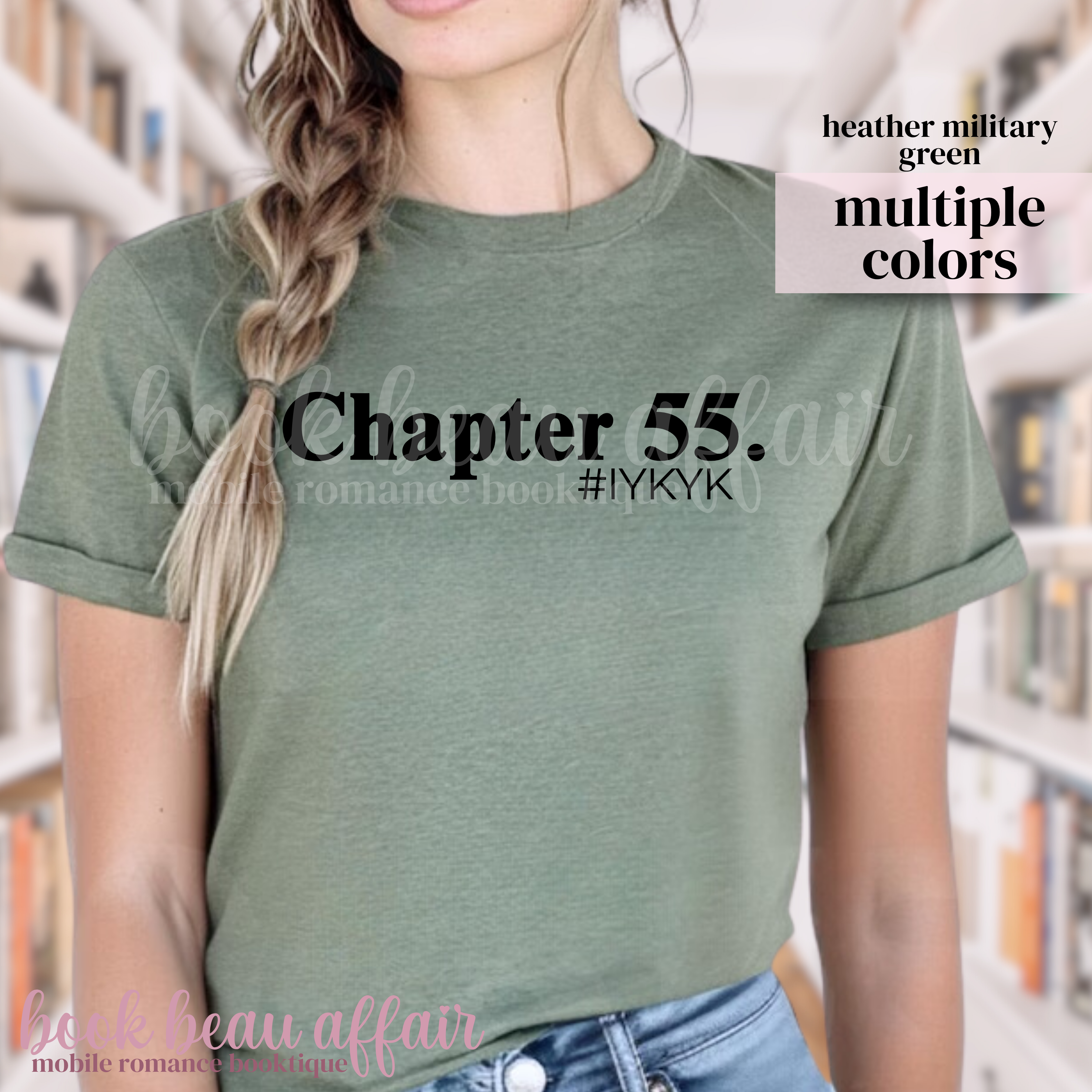 Person wearing a green t-shirt with 'Chapter 55 #IYKYK' text in a library setting