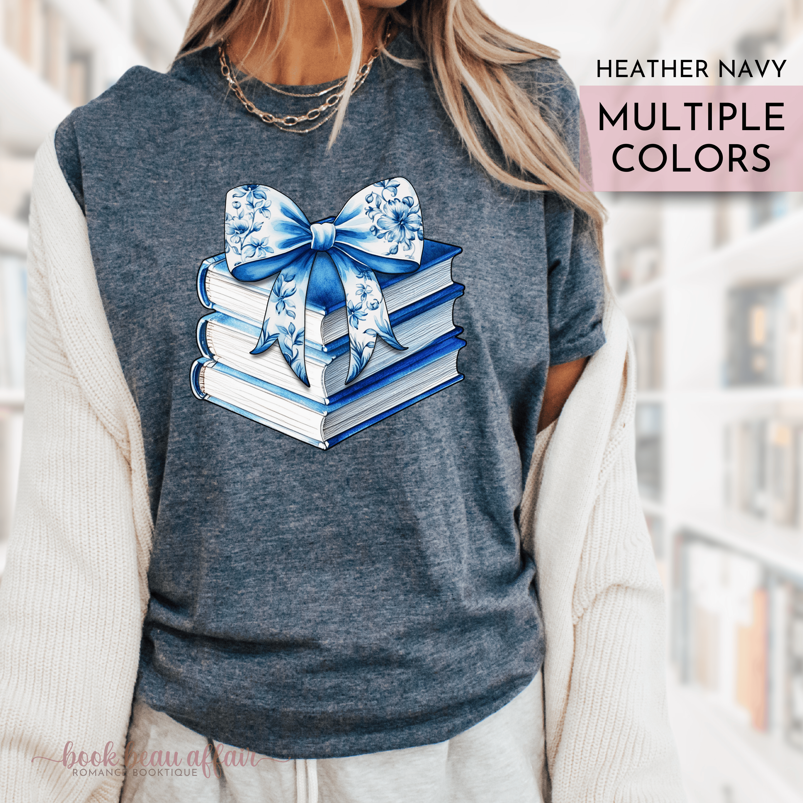 watercolor stack of books and chinoiserie floral bow on top. coquette-style bow. soft bookish tee. Heather Navy