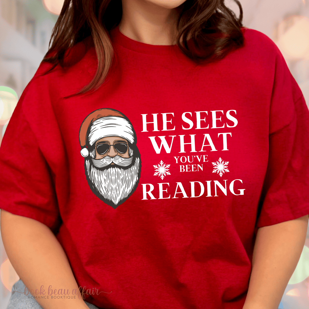 He sees what you've been reading tee, christmas tshirt, christmas book shirt, santa clause shirt, antique cherry close up
