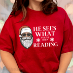 He sees what you've been reading tee, christmas tshirt, christmas book shirt, santa clause shirt, antique cherry close up