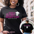 Person wearing a black t-shirt with 'David & Thorsten's Creamery & Cafe' text and logo.