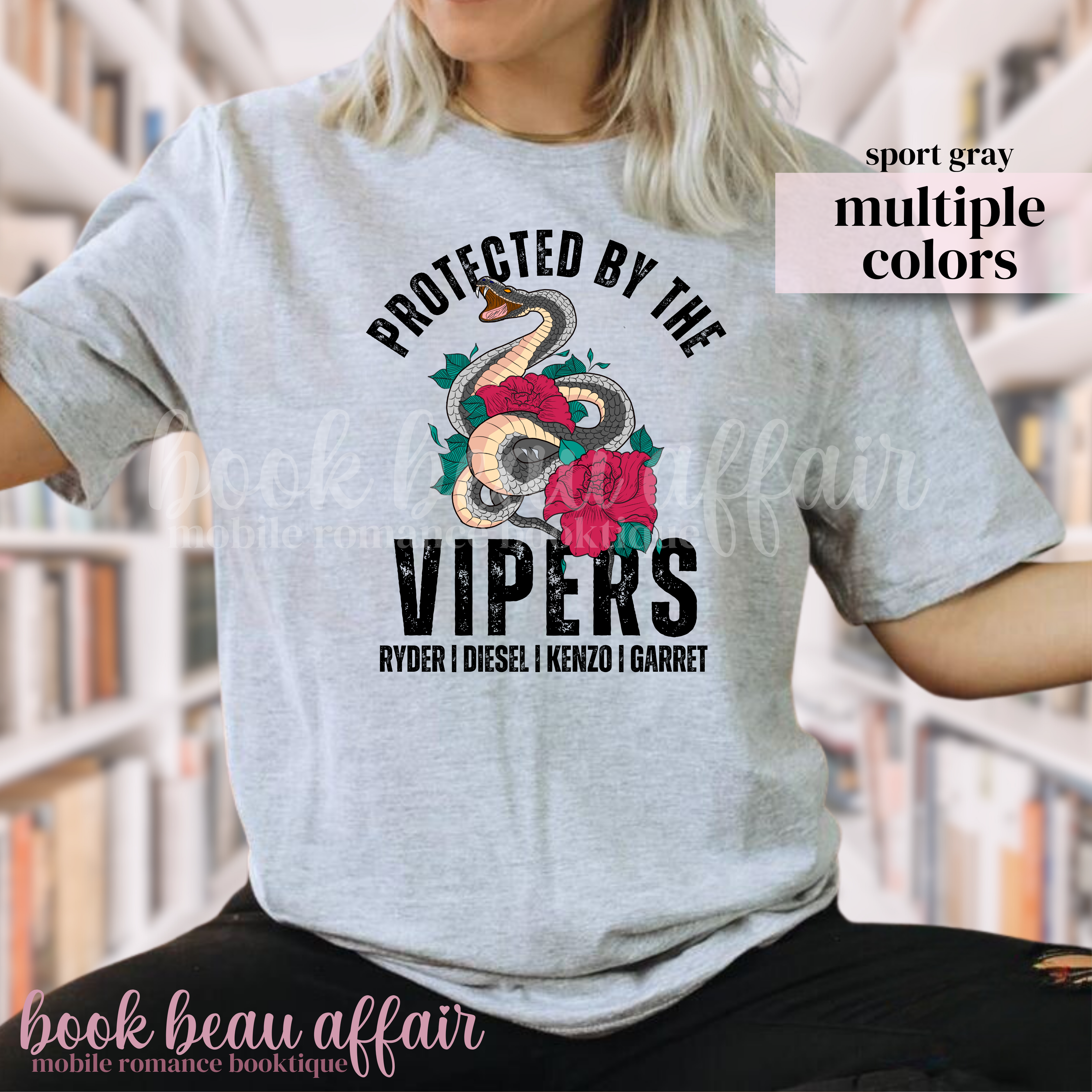 Person wearing a gray t-shirt with 'Protected by the Vipers' design and text.