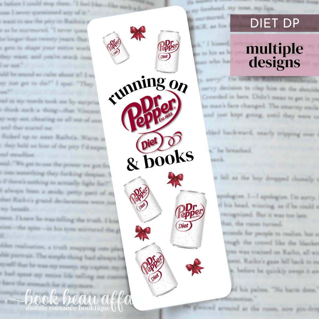 Dr Pepper bookmark with text 'running on Diet Dr Pepper & books' on a book page background
