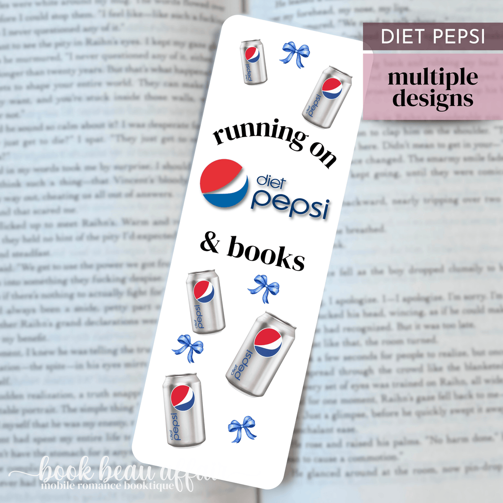 Bookmark with Diet Pepsi cans and text 'running on diet Pepsi & books' on a book page.