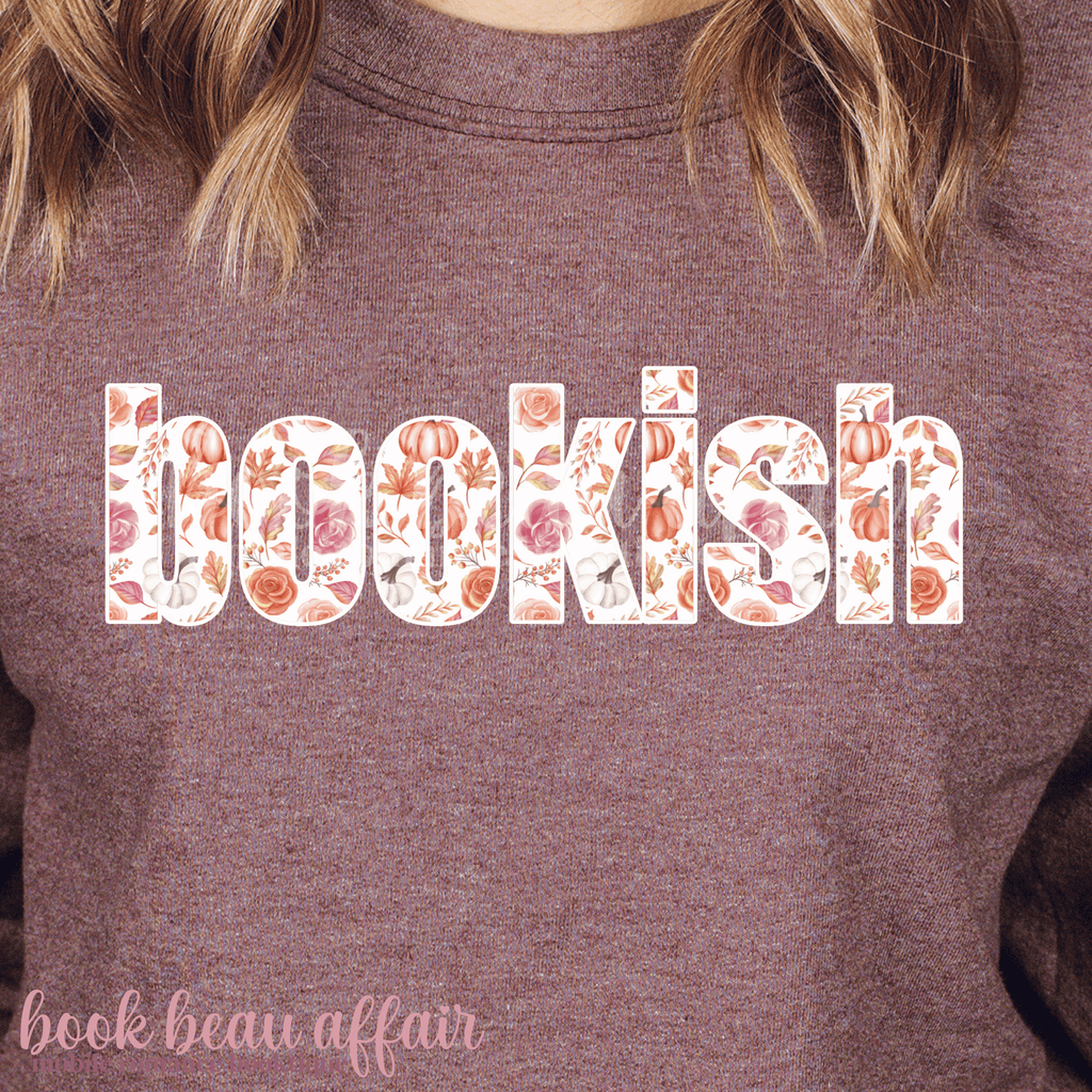 maroon sweatshirt with 'bookish' text featuring floral and pumpkin designs