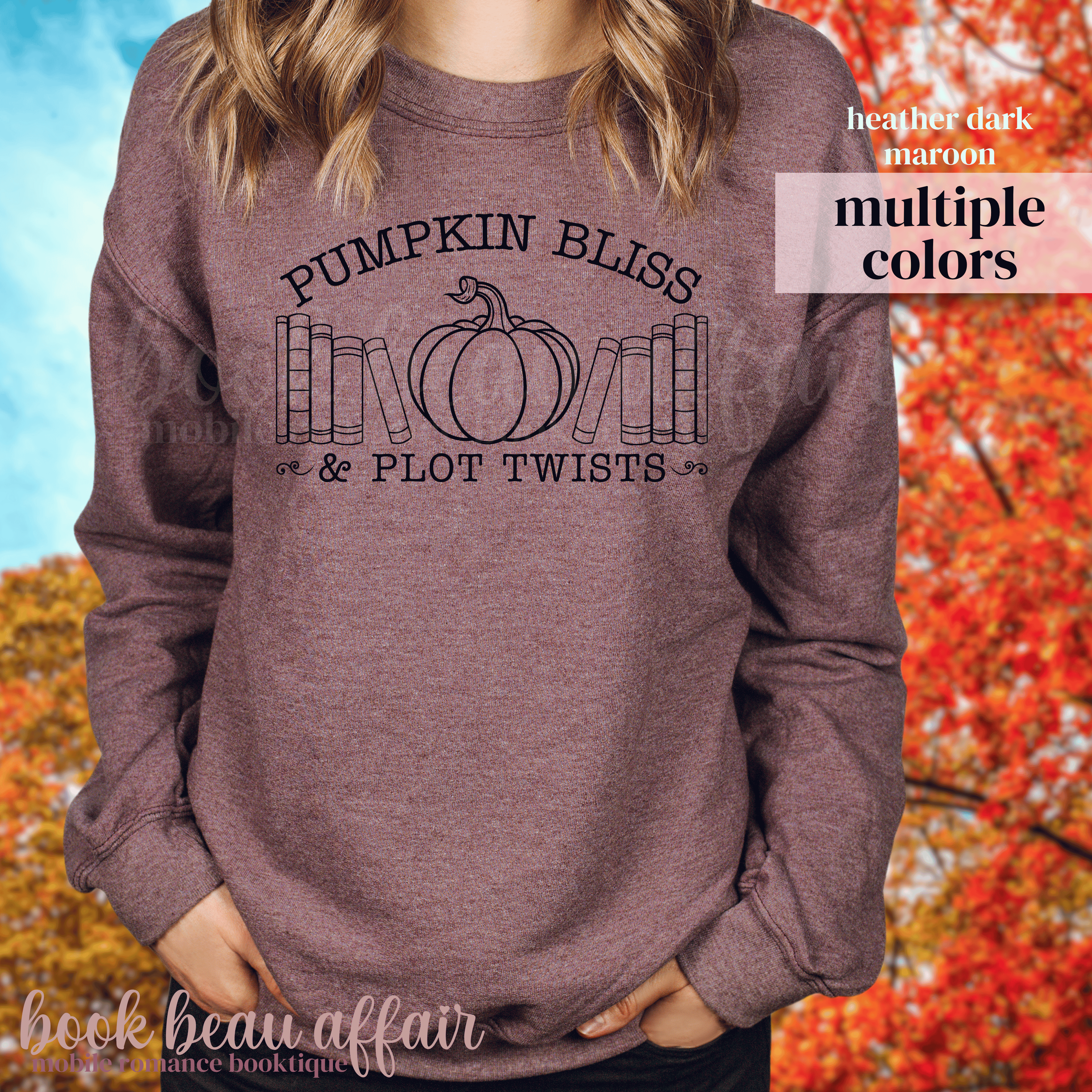Maroon Sweatshirt with 'Pumpkin Bliss & Plot Twists' text and pumpkin graphic