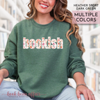 bookish - with fall florals and pumpkins on a dark green sweatshirt