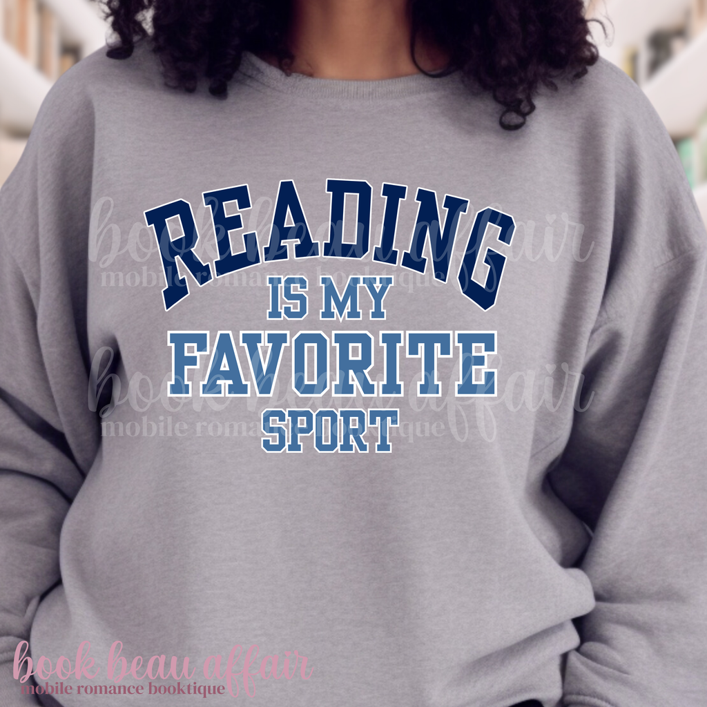 Gray sweatshirt with 'Reading is my favorite sport' text in blue and black.