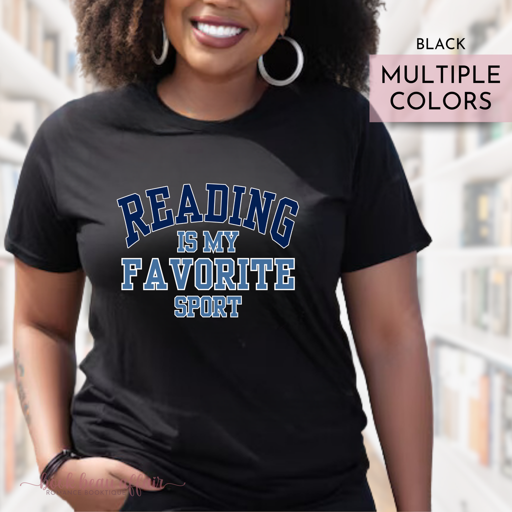Person wearing a black t-shirt with 'Reading is my favorite sport' text, standing outdoors.