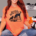 Orange t-shirt with 'Salem Book Club' design featuring a black cat, raven, and books.