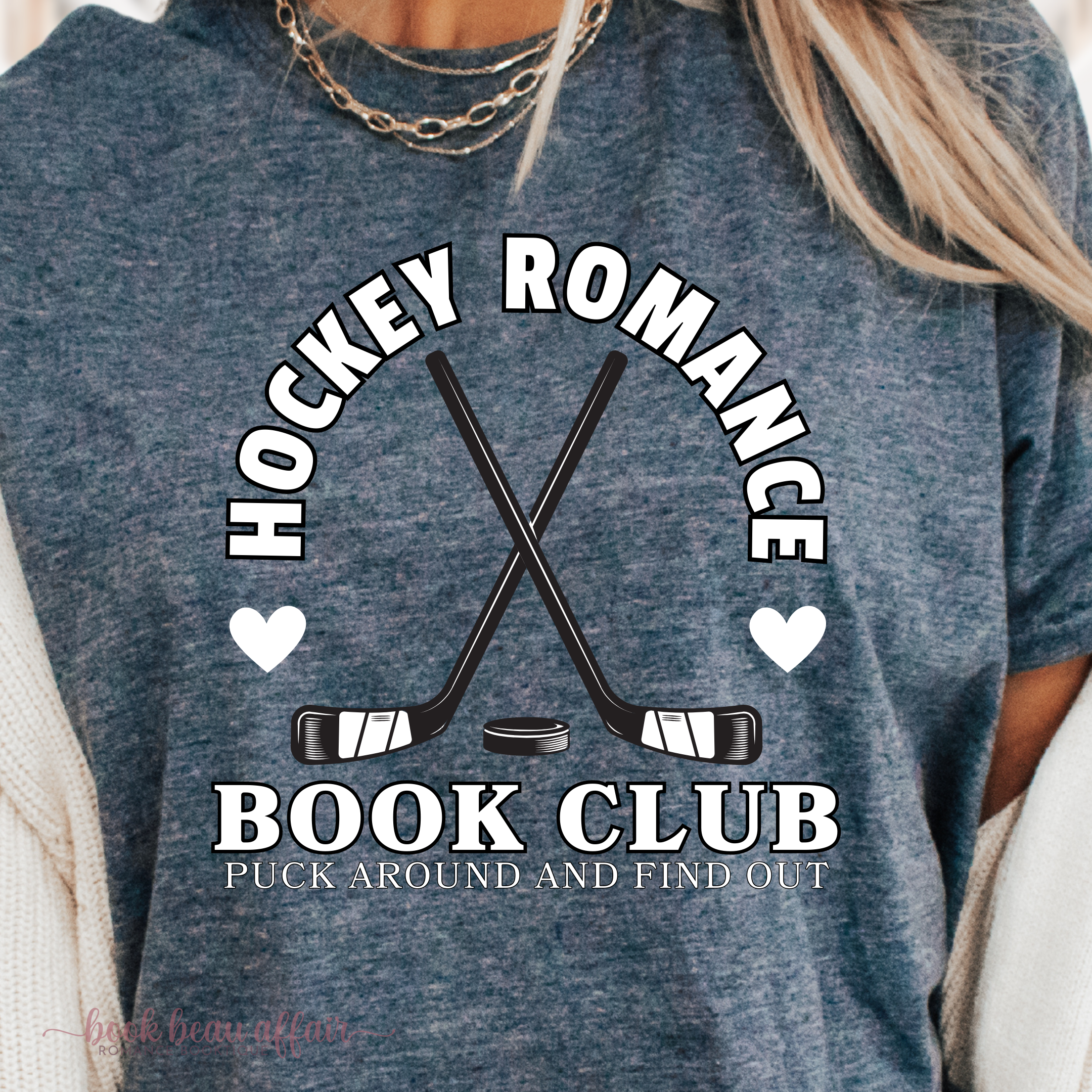 Close up of Hockey Romance Book Club graphic tee with 'Puck Around and Find Out' text. funny hockey romance tee for book lovers and sports romance fans. Heather Navy.