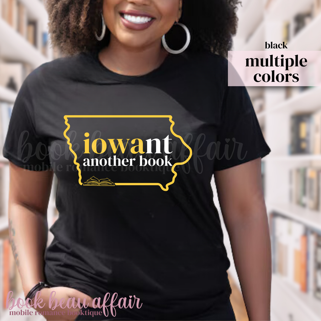 Person wearing a black t-shirt with 'iowant another book' design with an outline of the state of iowa