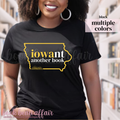 Person wearing a black t-shirt with 'iowant another book' design with an outline of the state of iowa