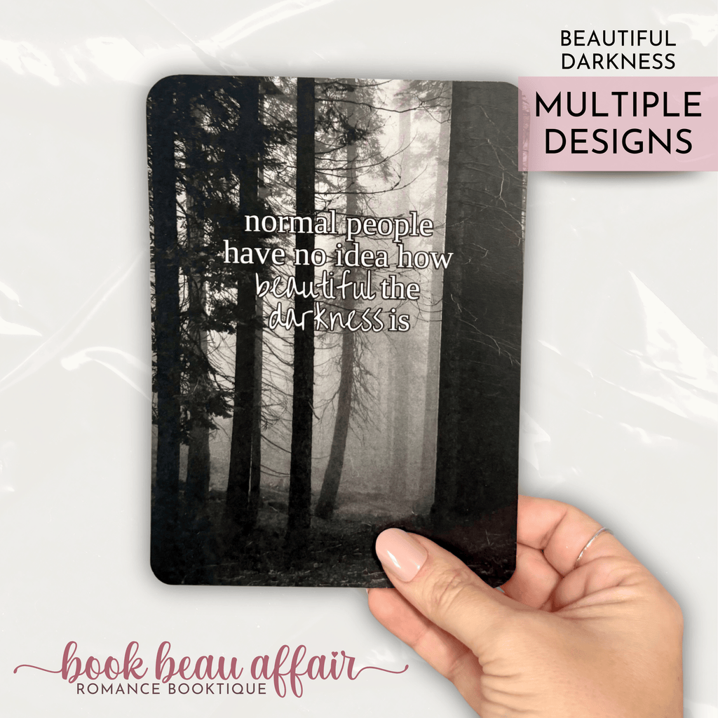 Kindle insert with forest design and text 'normal people have no idea how beautiful the darkness is'