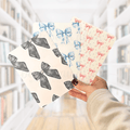 A group of kindle case inserts with bows on them