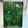 Kindle case insert  green background with Christmas-themed design featuring trees, presents, and ornaments 