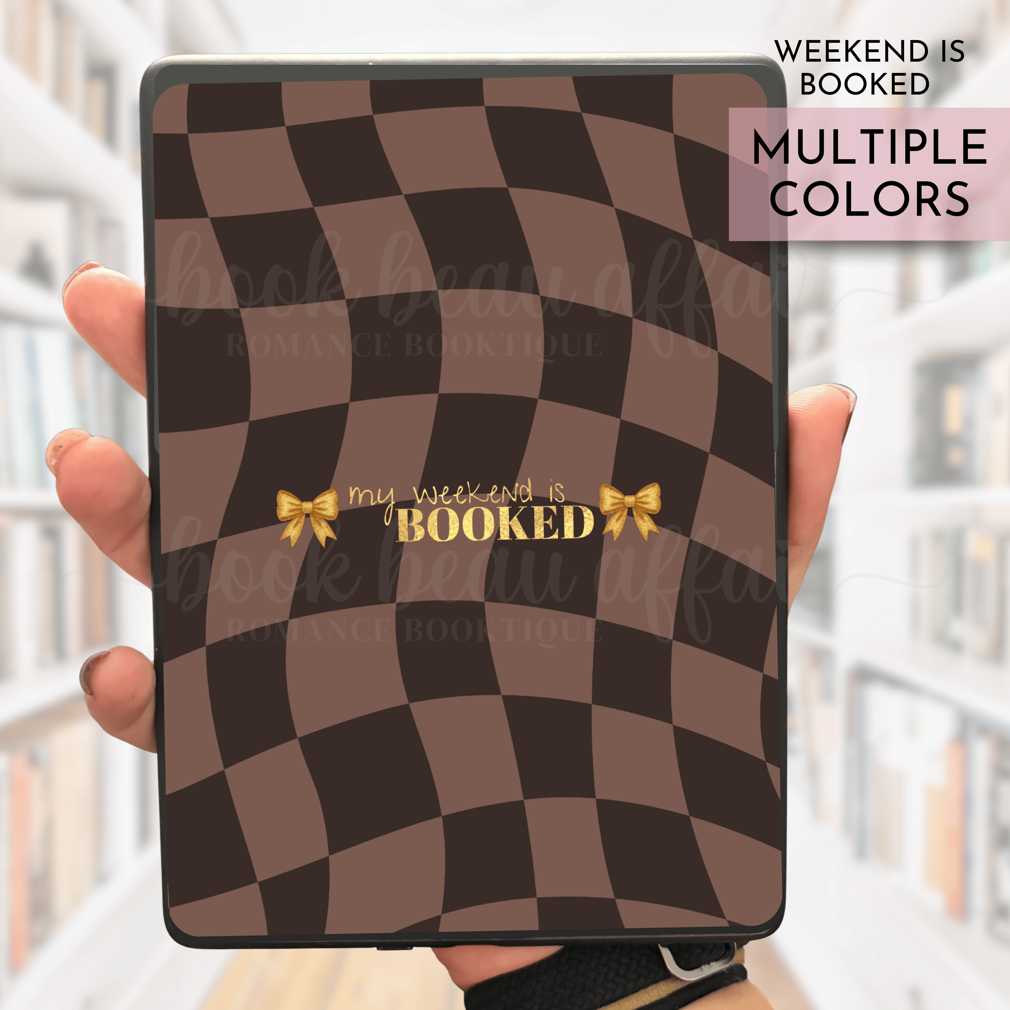 A caramel and brown checkered kindle case insert that says "My weekend is booked" in gold glitter text