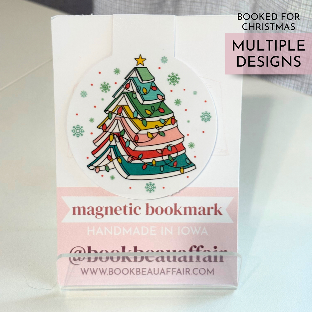 magnetic bookmark with a christmas tree made out of books stacked on top of each other