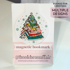magnetic bookmark with a christmas tree made out of books stacked on top of each other