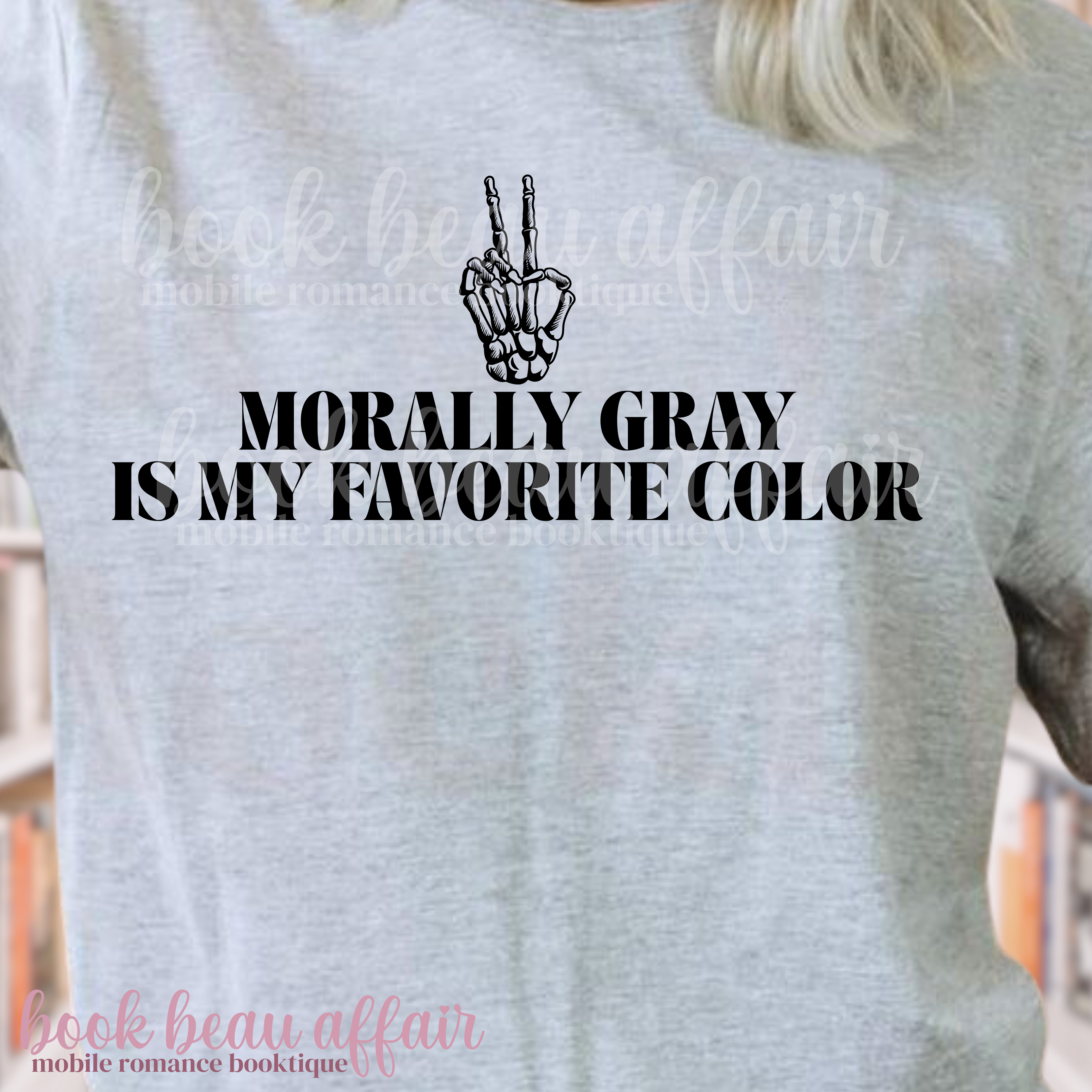 T-shirt with text 'Morally Gray is my favorite color' and a skeleton hand peace sign.