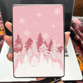 Kindle case insert with winter design of trees and snowflakes on a pink background