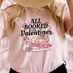 close up of All Booked for Valentines Day shirt Bookish valentines. Books and hearts.  light pink