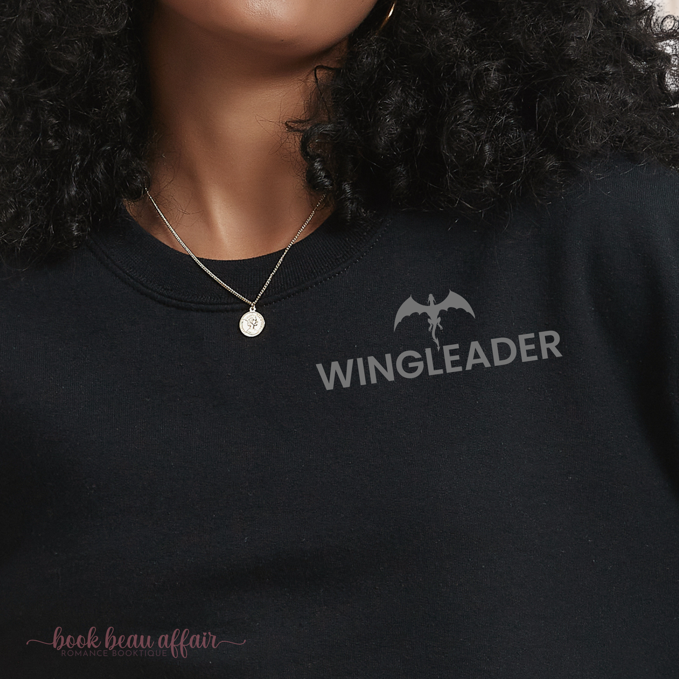 Close up of front of Wingleader, Fourth Wing Shirt, Dragon Rider, Flight Jacket, Xaden Riorson, Black Crewneck Sweatshirt. Violet Sorrengail. Rebecca Yarros